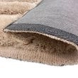 Denne produkten heter Moody Bow, laget av Polyester materiale med en vakker Beige farge – SE Mattor