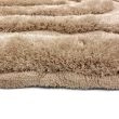 Denne produkten heter Moody Bow, laget av Polyester materiale med en vakker Beige farge – SE Mattor