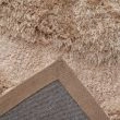 Denne produkten heter Moody Bow, laget av Polyester materiale med en vakker Beige farge – SE Mattor