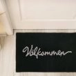 Denne produkten heter Välkommen, laget av Polypropylen materiale med en vakker Svart farge – SE Mattor