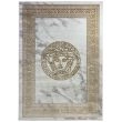 Denne produkten heter Wico Versace Face, laget av Polyester & Polypropylen materiale med en vakker Gull farge – SE Mattor