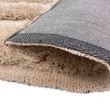 Denne produkten heter Moody Bow, laget av Polyester materiale med en vakker Beige farge – SE Mattor