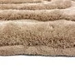 Denne produkten heter Moody Bow, laget av Polyester materiale med en vakker Beige farge – SE Mattor
