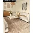 Denne produkten heter Moody Bow, laget av Polyester materiale med en vakker Beige farge – SE Mattor