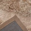 Denne produkten heter Moody Bow, laget av Polyester materiale med en vakker Beige farge – SE Mattor