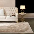 Denne produkten heter Moody Bow, laget av Polyester materiale med en vakker Beige farge – SE Mattor