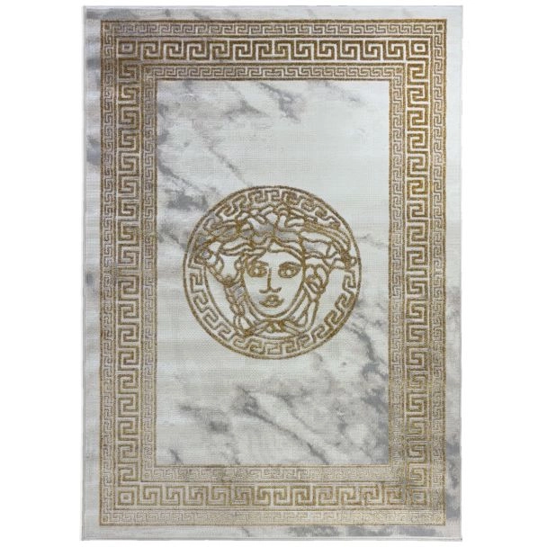 Denne produkten heter Wico Versace Face, laget av Polyester & Polypropylen materiale med en vakker Gull farge – SE Mattor